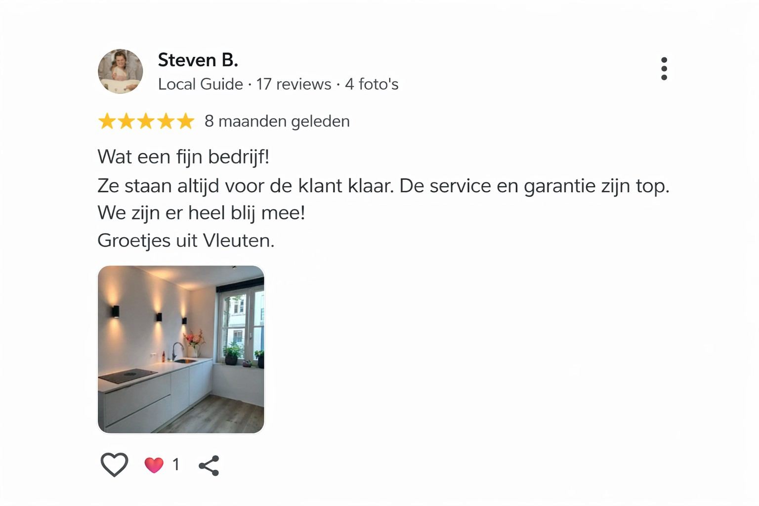 Schermafbeelding van een Google review met een opleverfoto